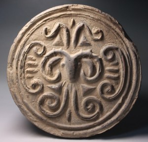 Tile end with the pictographic image of a sheep head