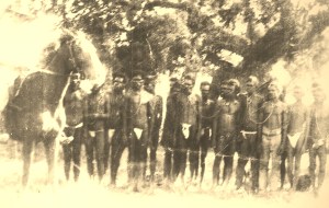 Indigenous people in front of the Boab Prison Tree